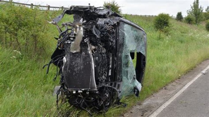 2 face charges after crash; driver sought