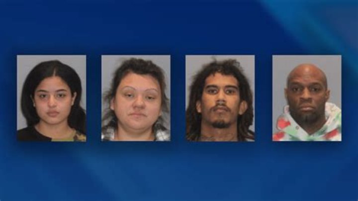 4 charged with armed robbery