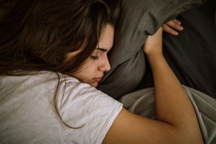 5 Reasons You Always Sleep Through Your Alarm, According To Science