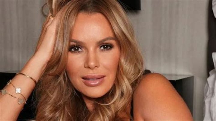 Amanda Holden bares all in sexy black lingerie as she shows off curves