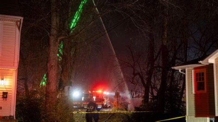 An explosion leveled a home in Arlington, Virginia, as officers tried to serve a search warrant