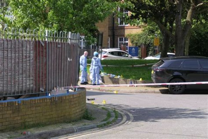 Battersea shooting: Tributes to man, 21, shot dead 'while standing on a street' as cops probe murder
