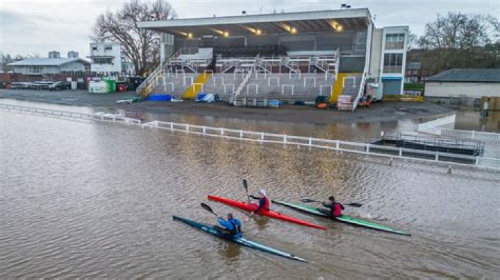 Beloved British racecourse sinks under extreme flooding as kayakers paddle down home straight