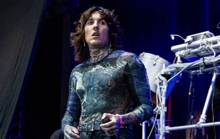 Biography, Musical Career, BMTH, Wife, Net Worth