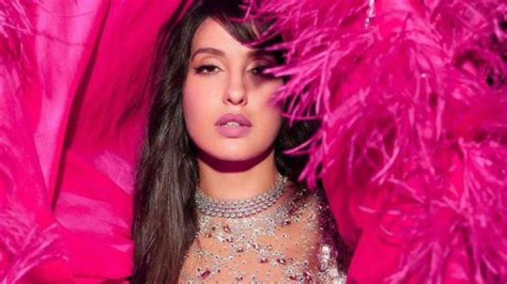 Birthday girl Nora Fatehi’s Rs 3.65 lac silver crystal-embellished Balenciaga bag has us day-dreaming