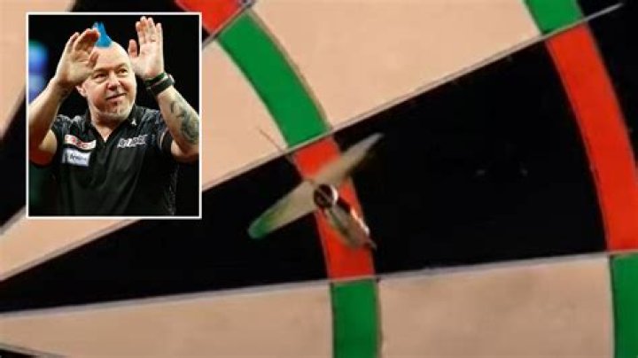 Bizarre darts optical illusion as Peter Wright hits treble 13 but fans are convinced he missed... so what do you see?