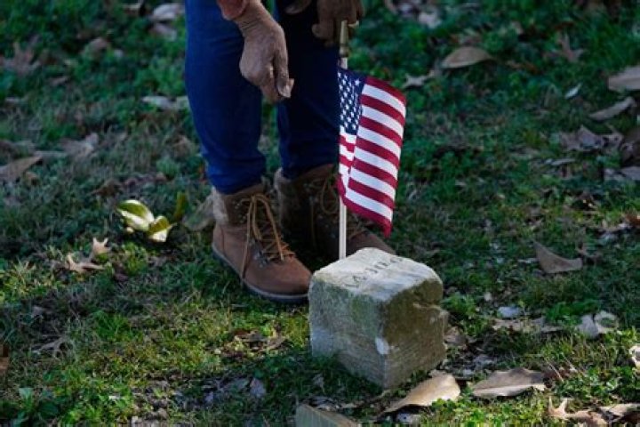 Black soldiers are honored, name by name, at a Civil War battlefield