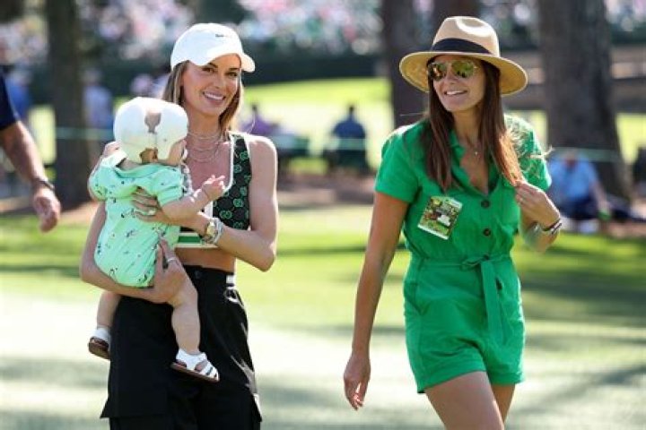 Brooks Koepka's stunning wife Jena Sims goes topless as she leaves little to imagination in open gown