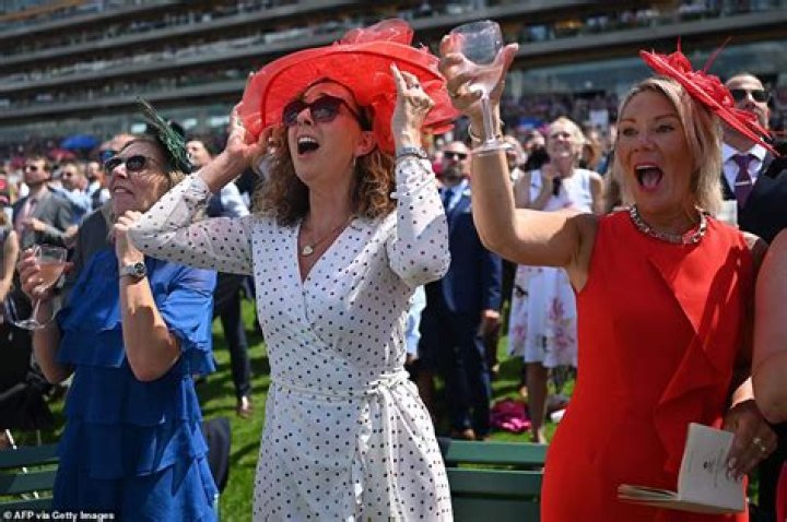 Cheltenham racegoers pull out all the stops for Gold Cup day with daring frocks and VERY fancy hats
