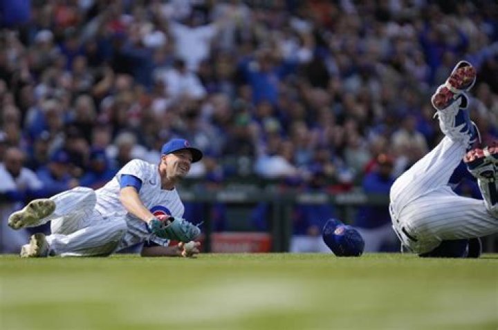 Collision ends Smyly perfect game bid, Cubs top Dodgers 13-0