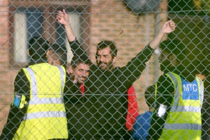 Cops pelted with bottles as they shut down illegal New Year's Eve rave as hundreds trash 500-year-old Essex church
