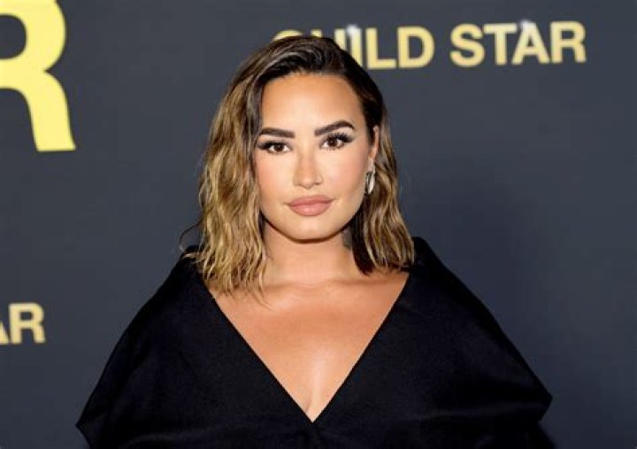 Demi Lovato's 'Vagina' Tattoo Artist Twitter Battle Teaches Us Important Lessons About Tattoos As Fashion