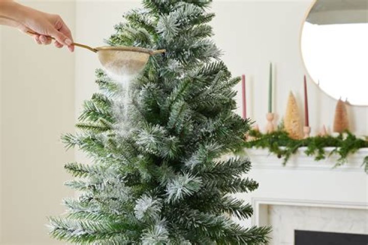 Expert reveals simple mistakes which make your Christmas tree look tacky - from 'cheap baubles' to colourful fairylights