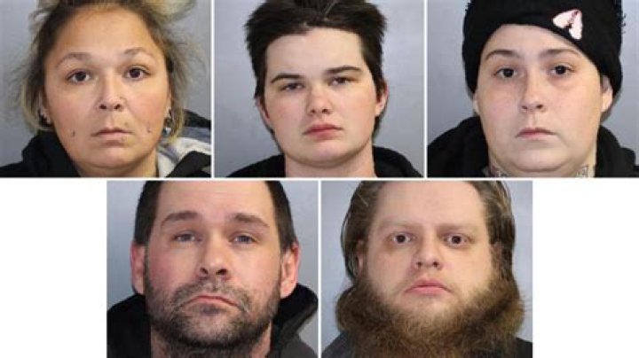 Four people charged with murder after shooting