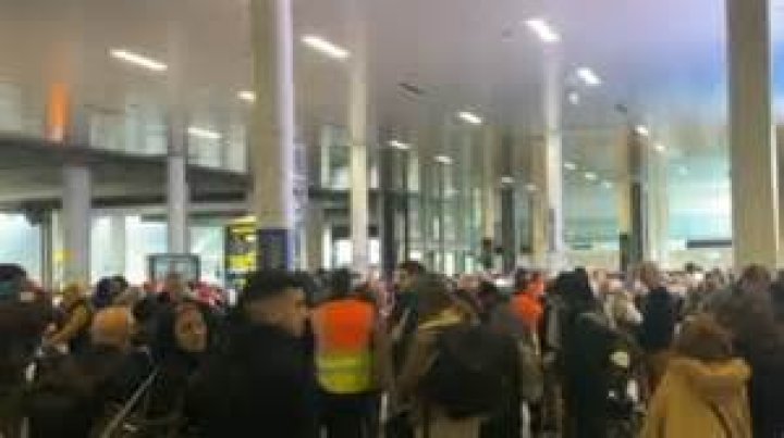 Gatwick airport evacuated after fire alarm as south terminal fills with choking smoke