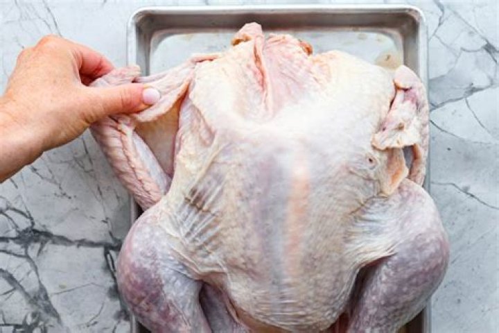 How do you tuck in turkey wings for roasting?