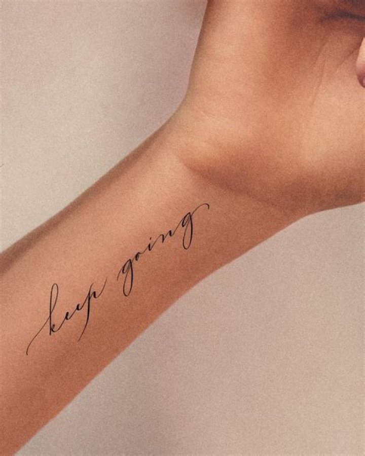 I got a cheap tattoo on holiday in Ayia Napa and it's a big regret... it looks like a wonky banana