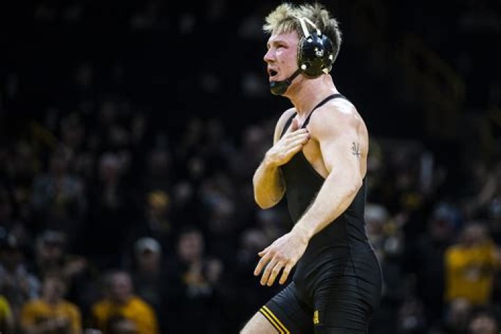 Iowa Men’s Wrestling Head Coach Tom Brands visits the Grid Club