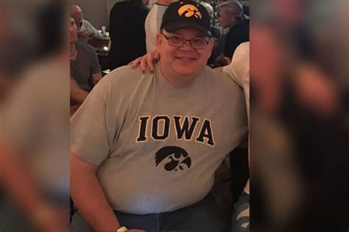 Iowa principal who risked his life to protect students during a high school shooting has died
