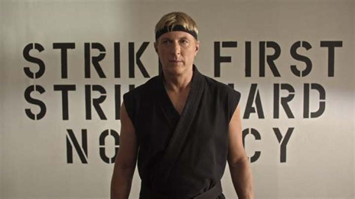 Is Johnny Lawrence a black belt?