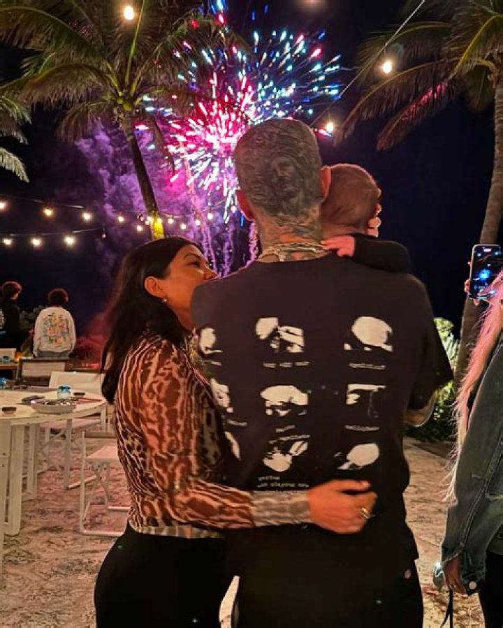 Kourtney Kardashian & Travis Barker Reveal First Photos Of Son Rocky