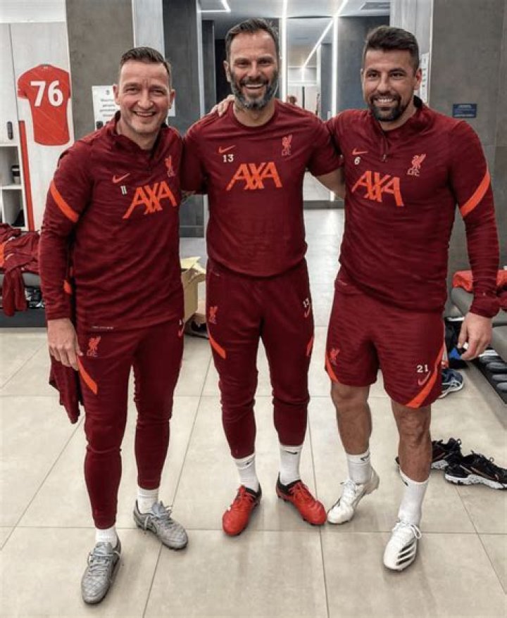 Liverpool cult hero looks unrecognisable with full sleeve tattoos, a massive beard and his trademark long hair gone