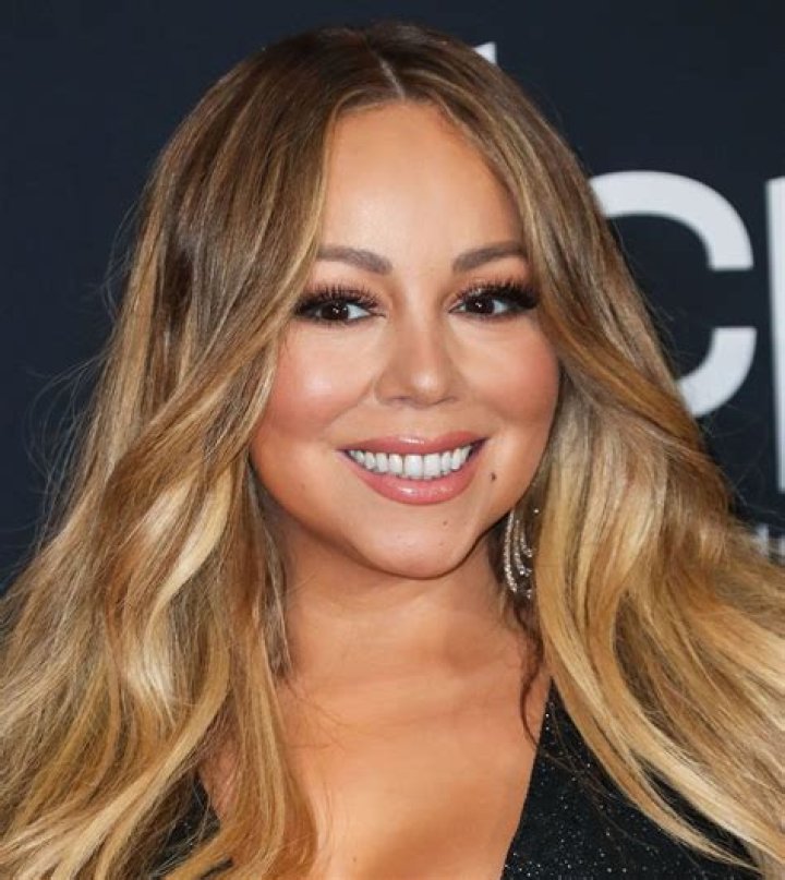 Mariah Carey tweets boob pic to hubby on his b'day