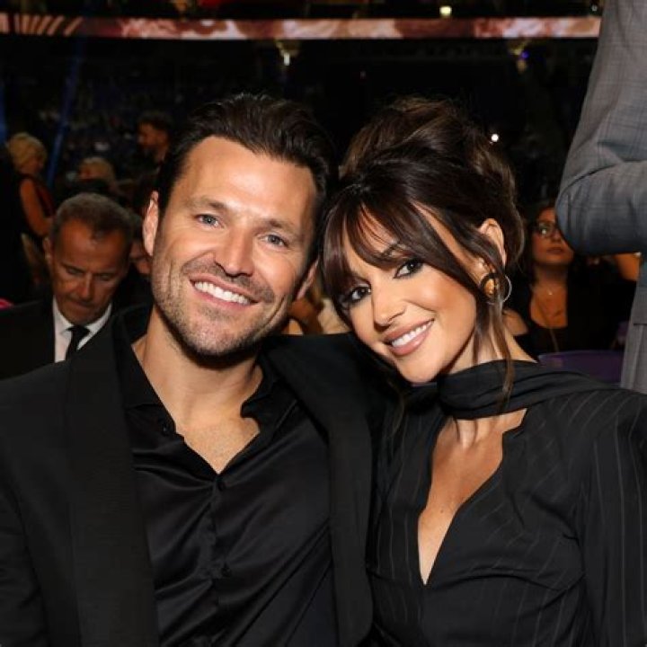 Michelle Keegan ditches wedding ring for Revlon event... despite partying with Mark Wright's sisters