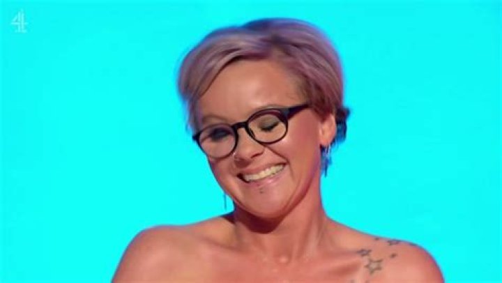 Naked TV presenter Jenny Scordamaglia strips off to allow a plastic surgeon to measure her boobs during her latest nude news broadcast