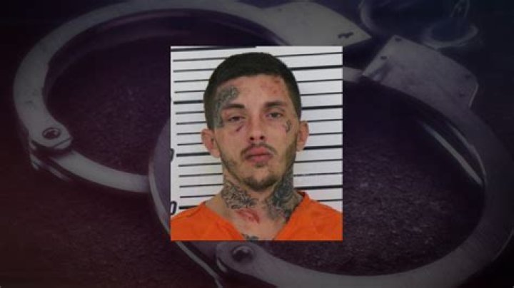 Police: Suspect spat, kicked at police, tried to take officer’s gun