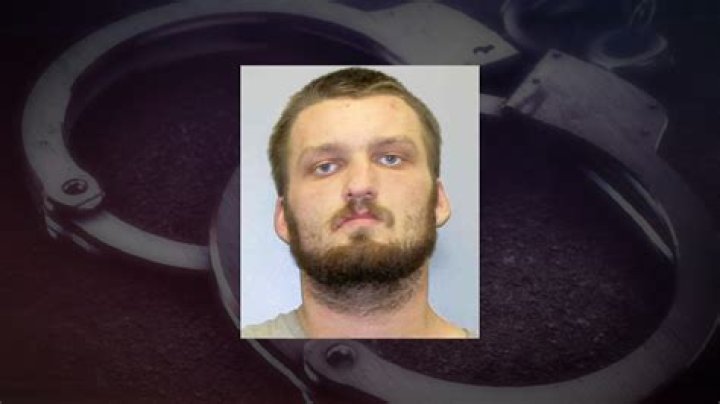 QC man arrested on nationwide warrant