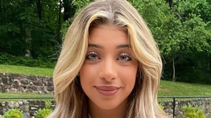 RHONJ: Gia Giudice in a body-hugging pink dress poses with her sisters