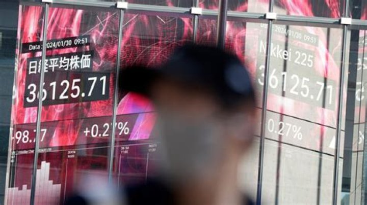 Stock market today: Asian shares are mixed, with Chinese shares falling, ahead of Fed rate decision