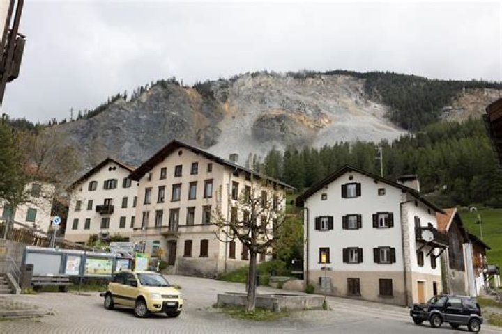 Stragglers pack up as Swiss village is evacuated under rockslide threat