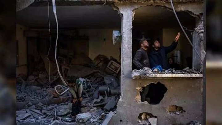 Strikes kill 13 in Gaza as Biden describes Israel’s military response as ‘over the top’