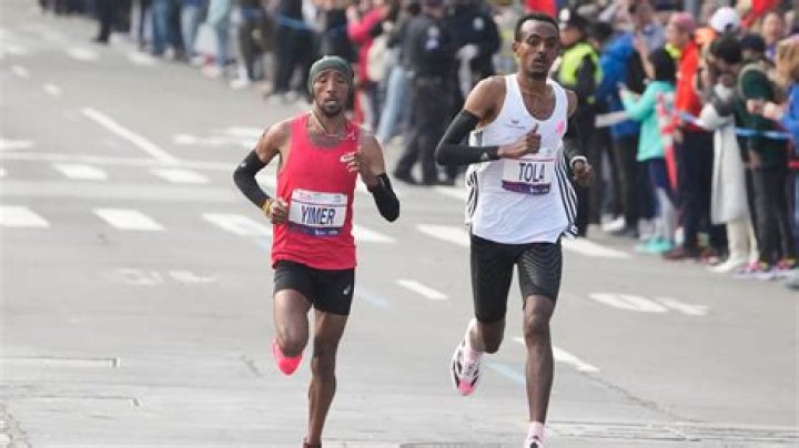 Tamirat Tola sets NYC Marathon course record to win men’s race; Hellen Obiri takes women’s title