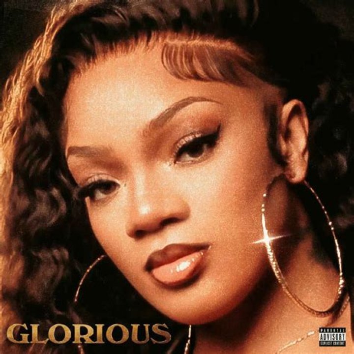 ‘The Infamous Kim Pose’: Lil’ Kim Approves of GloRilla’s Re-Creation of Her Iconic ‘Hard Core’ Cover