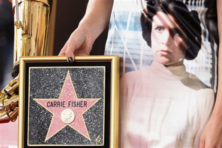 Videos Of Carrie Fisher Singing Will Make You Both Smile & Cry