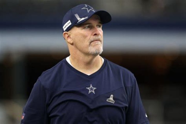 Washington Commanders hiring Dallas Cowboys defensive coordinator Dan Quinn as coach, AP sources say