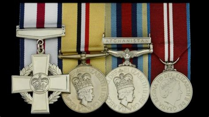 Who is Deacon Cutterham and why was he awarded the Conspicuous Gallantry Cross?