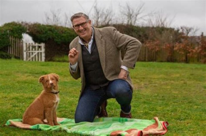 Who is dog trainer Graeme Hall and what is his net worth?