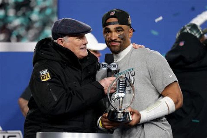 Who is George Halas and why is the NFC Championship Trophy named after him?