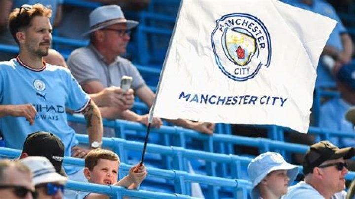 Why do Man City fans sing Blue Moon?