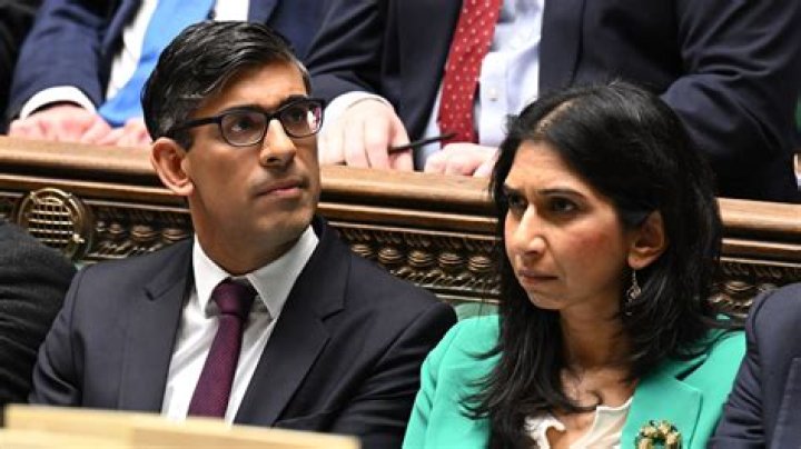 Woman, 36, hunted by cops over racist placard of Rishi & Suella is teacher who grew up in £2m house in home counties