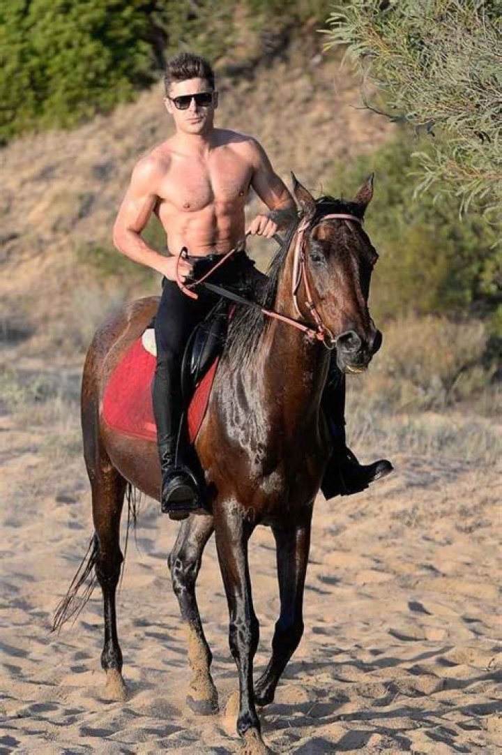Zac Efron’s Shirtless Horse Ride Is Epic But Did You Know He Posed with Bunnies in His Pockets? — PHOTOS